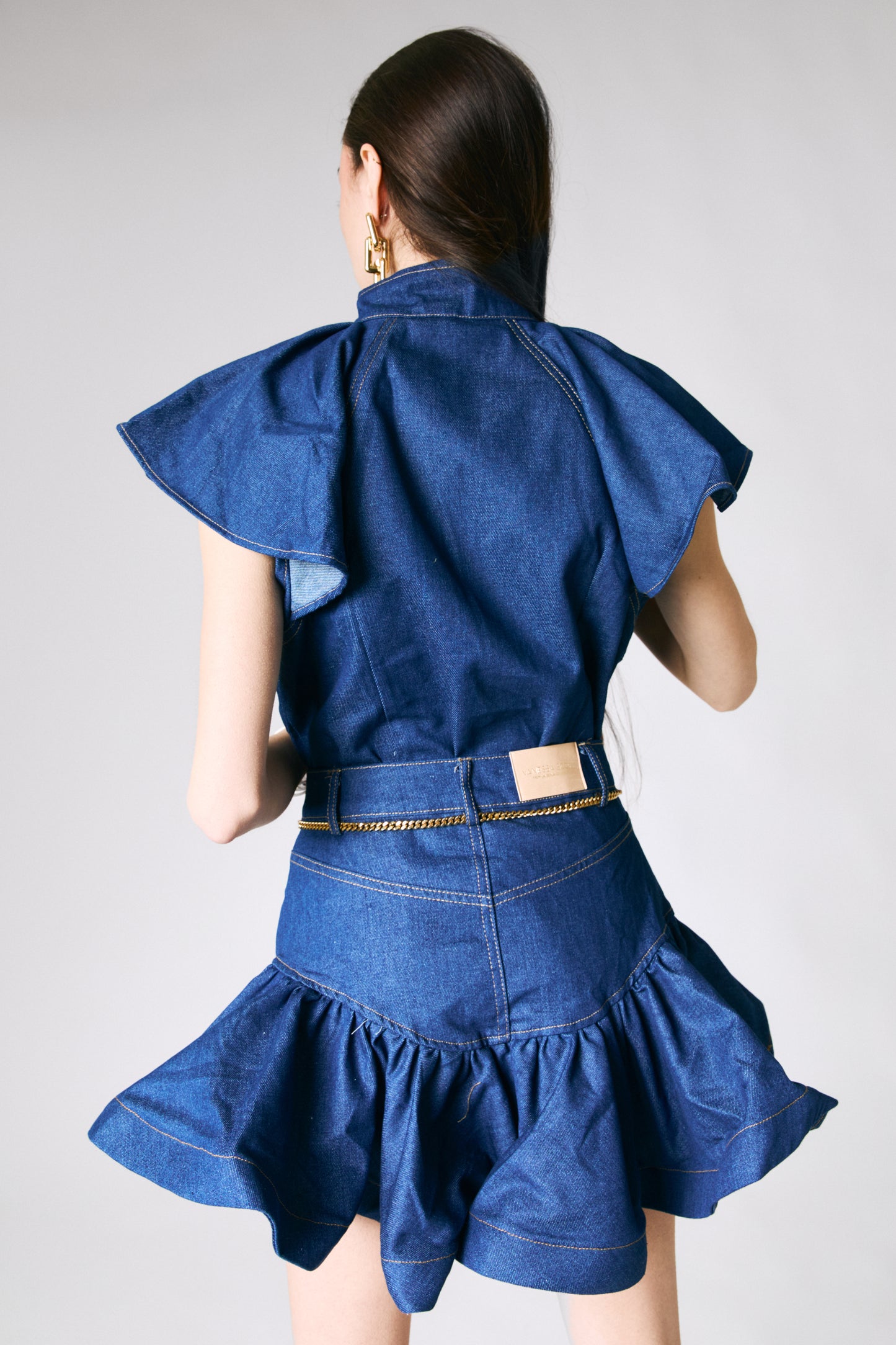 Completo denim con bottoni oro