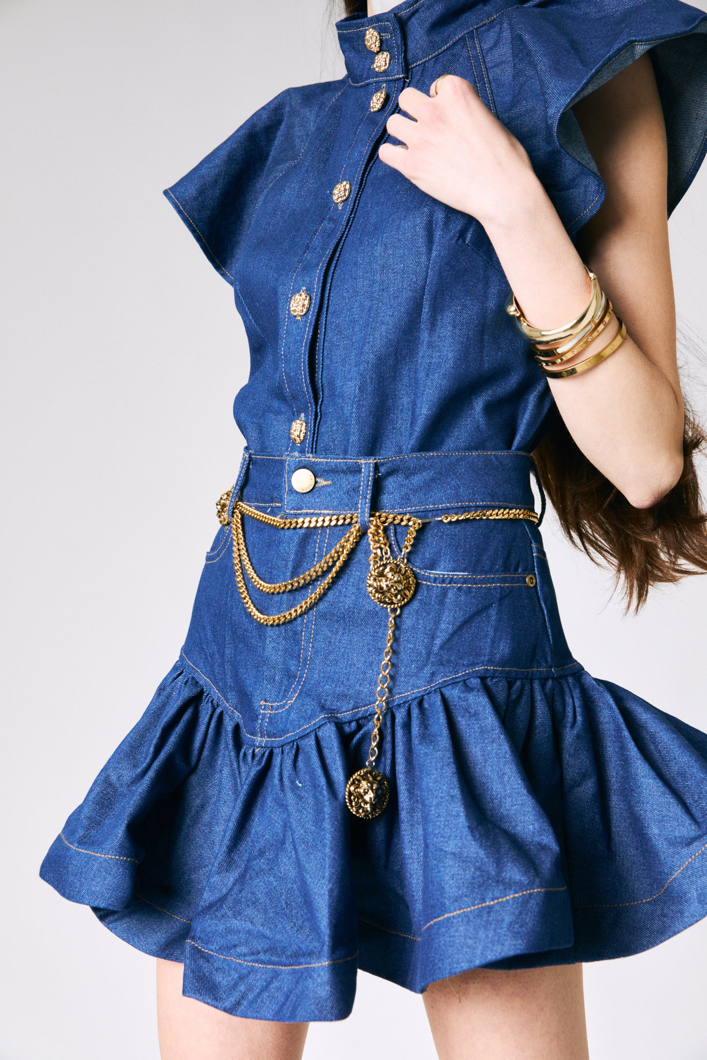 Completo denim con bottoni oro